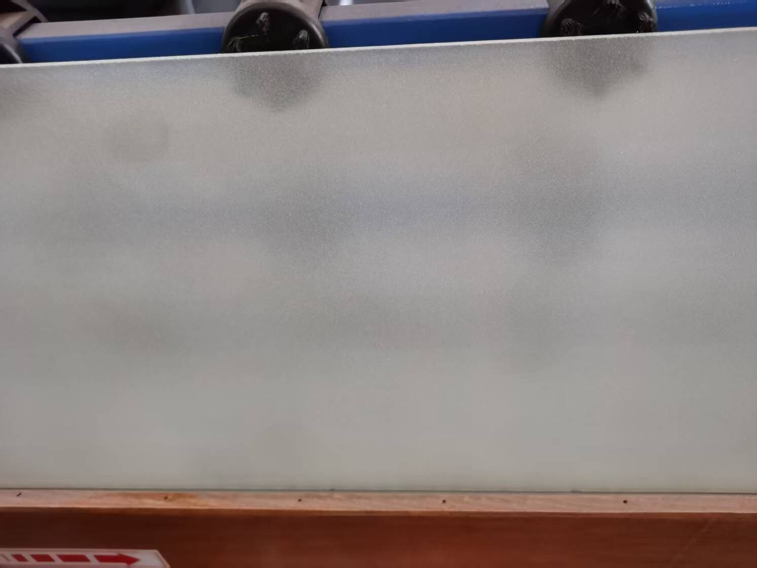 Evenly frosted glass panel produced on the automatic sandblasting machine