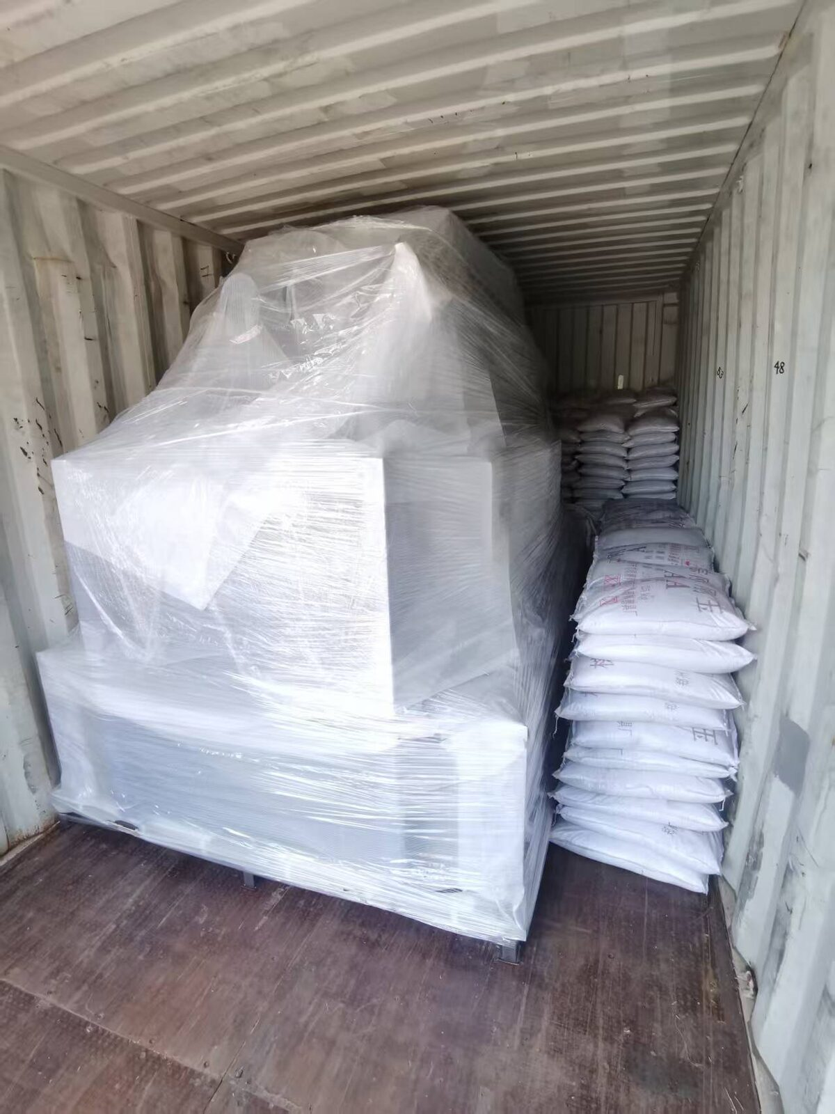Glass sandblasting machine crated and loaded in a shipping container